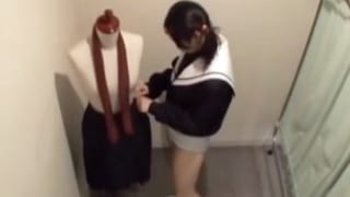 新しい制服を買いに来た中学生が試着室で悪戯されてる盗撮動画